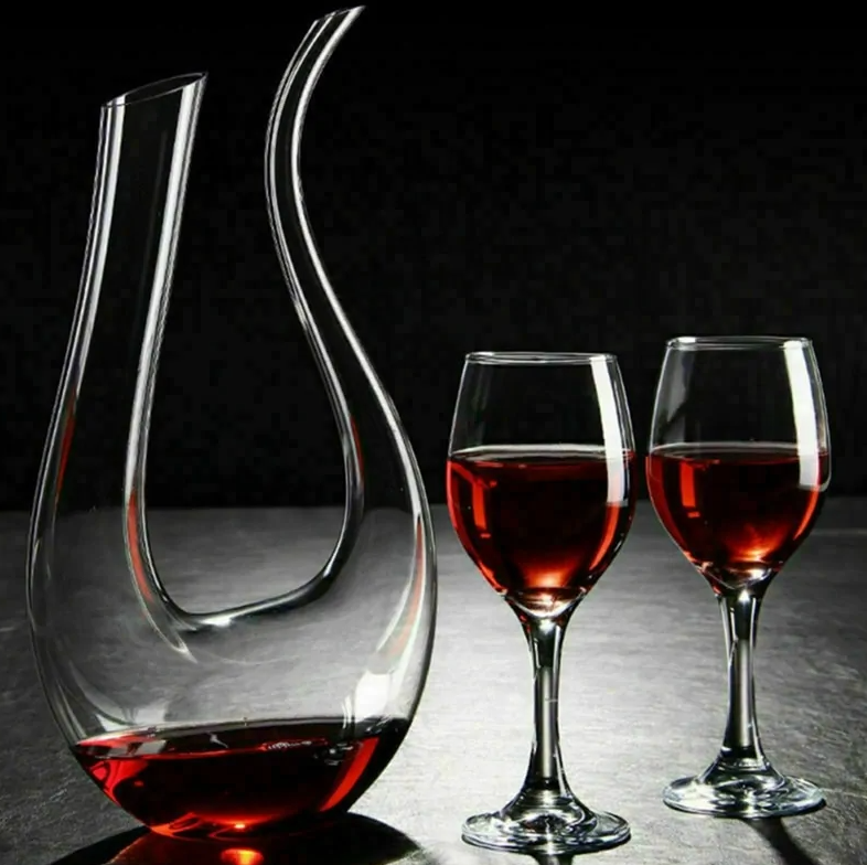 Swan shaped wine decanter. Open on both ends